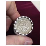 10 dollar roll of unsearched half dollars. 5-27