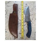 12in Damascus knife with sheath. 5-8