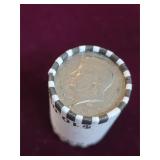 10 dollar roll of unsearched half dollars. 5-23