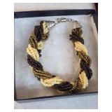 Multiple strand beaded bracelet. 5-60