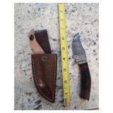 6.5in Damascus blade with sheath. 5-9