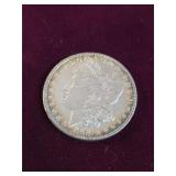 1886 Morgan silver dollar 90% silver. 5-55
