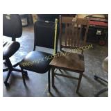Black stack chair and vintage oak dining chair