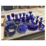 29 pieces blue dishes, bowls, cups vases, etc.