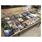 33 DVD movies, 20 VHS movies, tote full of