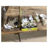 A lot of miscellaneous figurines, coffee, cups,
