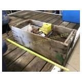 Vintage wooden crate with miscellaneous parts