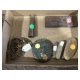 A lot of collectibles rocks, wire, male, finger,