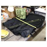 Two as new black garment, travel bags, and green