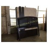 Queen size bed, complete with padded headboard,