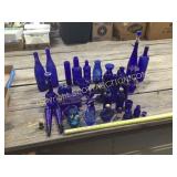 36 pieces of decorative blue glassware and