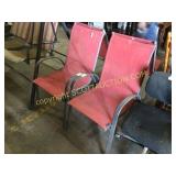 Four aluminum frame red patio chairs