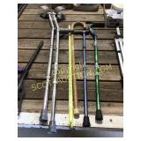 3 walking canes and a pair of armband