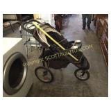 Large three wheeled stroller nice but needs clean