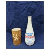 Japanese Plum Gekkeikan bottle & a pottery vase