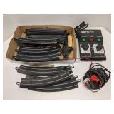 Group of HO scale track, transformers & parts