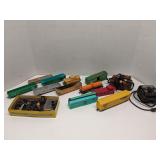 Group of HO scale train cars and parts