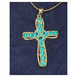 Silver-tone cross pendant w/ blues rhinestones &