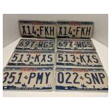 Group of old license plates