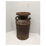 Vintage metal milk cannister, does have some rust