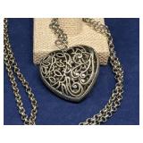 Silver-toned filigree heart pendant necklace