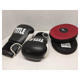 Pair of boxing gloves and practice pads