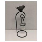 Wrought iron votive candle holder with bird