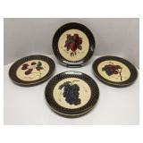 Set of 4 Raymond Waites decorative plates