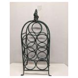 Green wrought iron wine rack