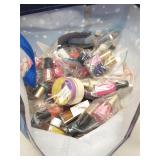 Bag of mostly nail polish bottles
