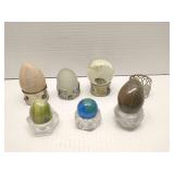 Group of eggs and paperweights