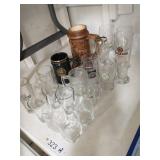 Group of barware on left side of table