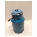 Vintage blue enamelware milk can