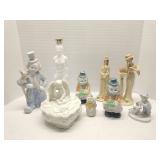 Group of ceramic and resin figures