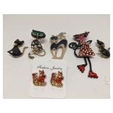 Group of cat themed broaches & earrings