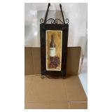 Metal framed hanging pic of Grappa