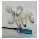 6 used light bulbs and a Kingsford refillable