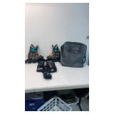 Rollerblades size 6 with guards and bag.