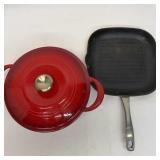 Enameled cast iron Dutch oven and a cast iron