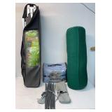 Yoga bolster, camping cot, tent poles and a set