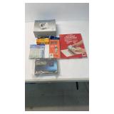 Blood pressure monitor and assorted items.