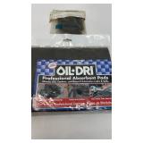 (Oil Dri) professional absorbent pads and a