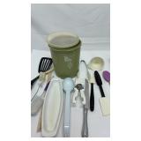 Various kitchen supplies. Spatula, bottle