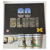U of M memorabilia cups from the 93 season watch