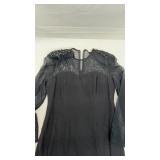 Woman's black dress.