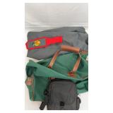 2 suit cases, 1 small carrying bag.