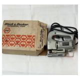 Black $ Decker jigsaw.