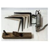 Antique planer, air pump and shelf brackets.