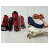 Flashlights, hot glue gun and electric scissors.