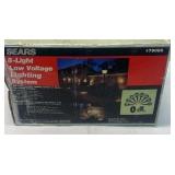 Sears brand outdoor low voltage light set. New in